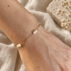 Goudkleurige armband Sola Zandkleur om een pols