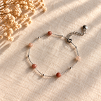 Zilverkleurige sieraden uit set Isla Vintage Rose met roze natuursteen