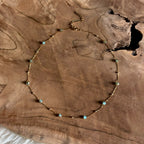 Goudkleurige ketting Isla Zeegroen met facetkraaltjes