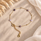 Armband Isla met verschillende paarse kraaltjes en gold filled spacerkralen